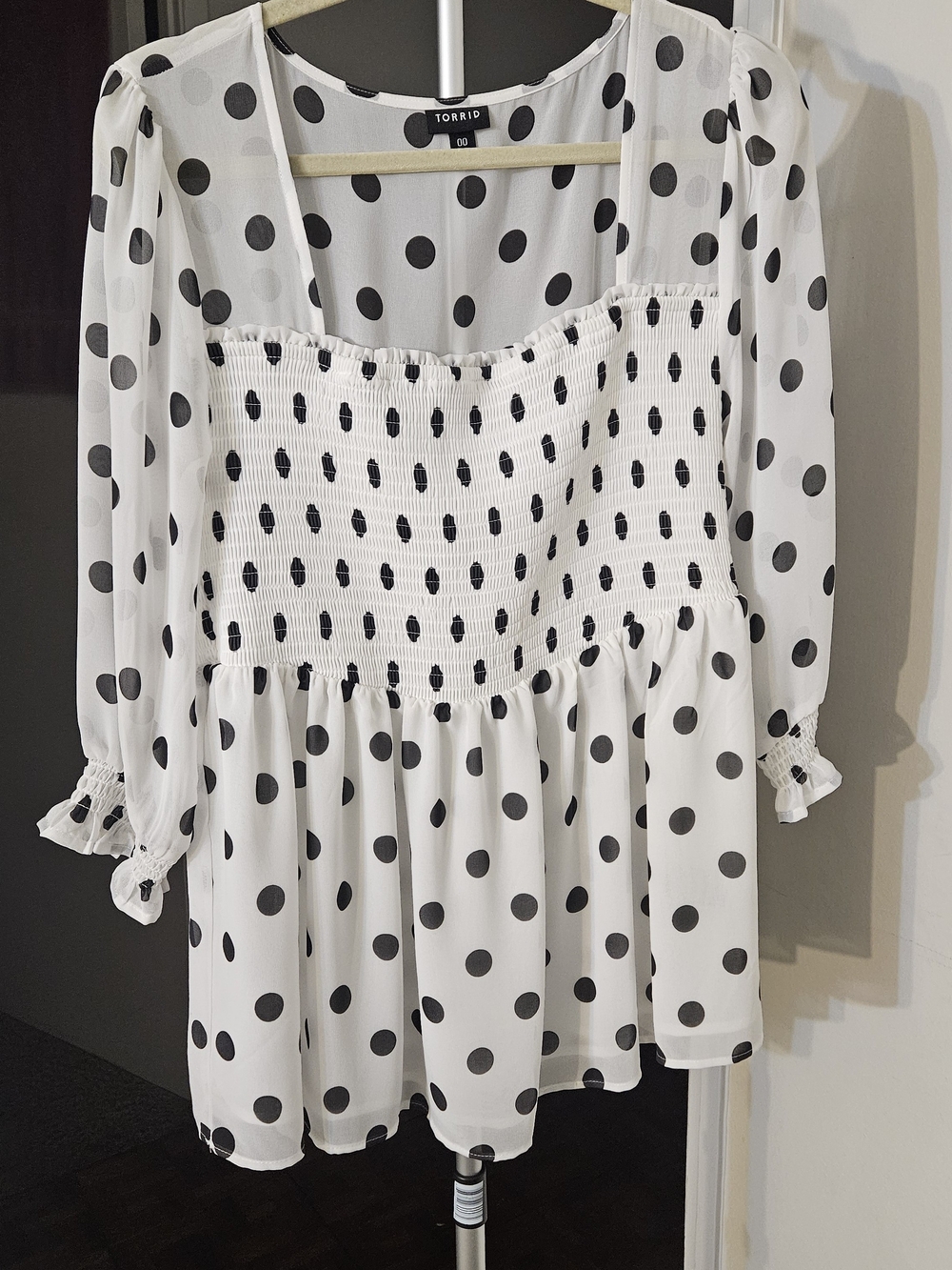 Torrid White and Black Polka Dot Smocked Peplum Top